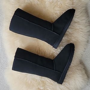 Ugg boots classic tall. Brand new. Ladies size 9.